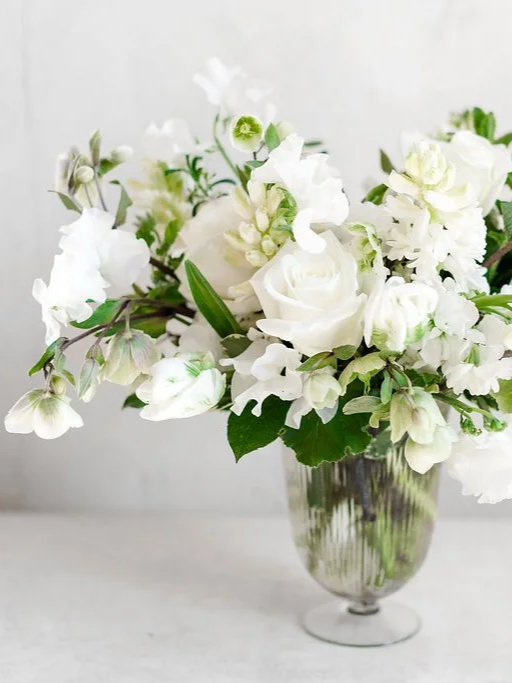 sacre-couer-white-flower-arrangement-banner.png