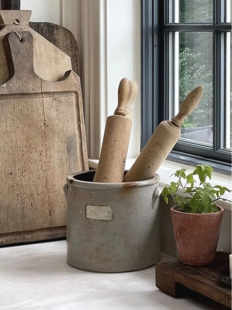 french-country-kitchen-antique-breadboards-stoneware-crock-rolling-pins.jpg