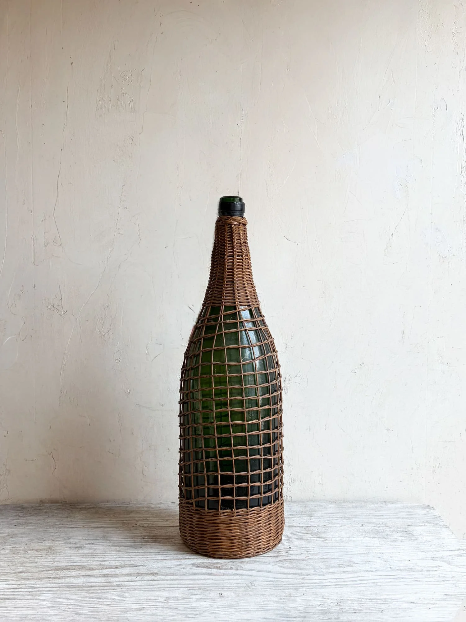 rattan-wicker-encased-bottle-antique-french-wine-bottle.jpeg
