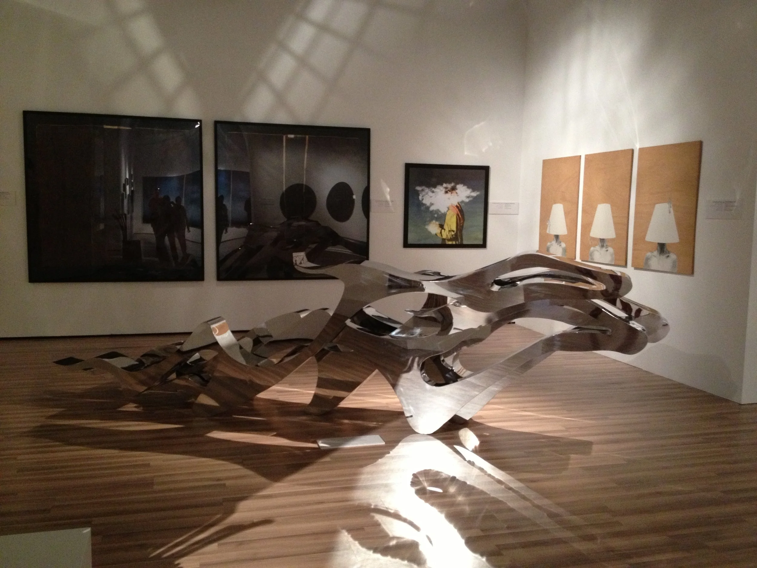Three Generations: Sculpture by Matter Bin Lahej. Behind from left to right Maitha Demithan, Hamdan Buti Al Shamsi & Shamsa Al Omaira