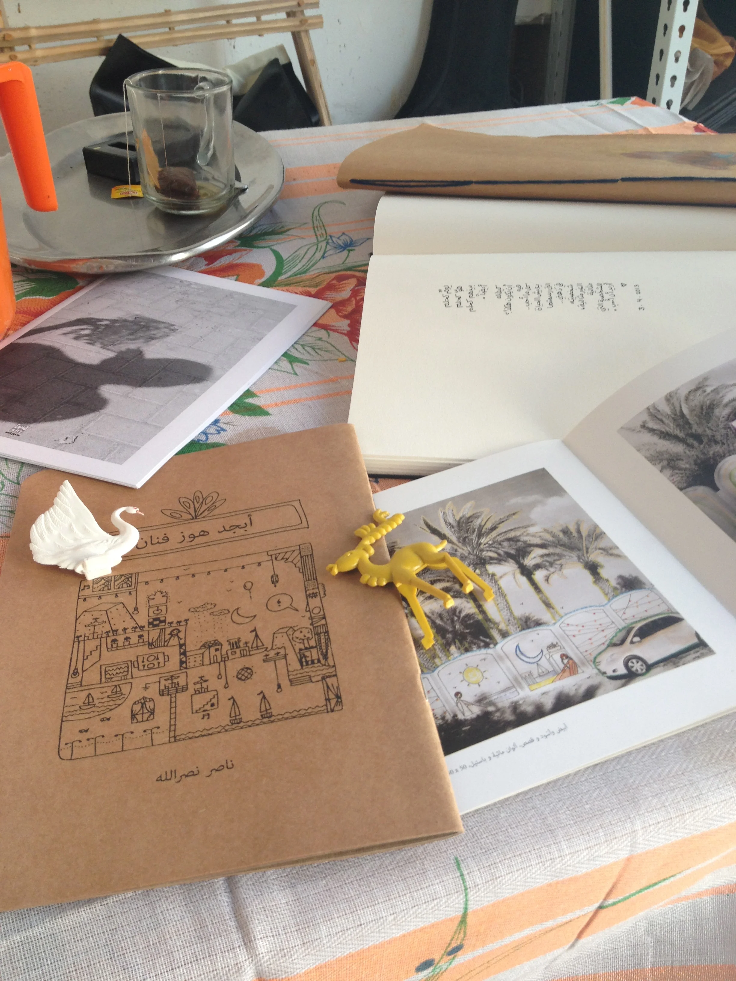 Tea, flipping through sketchbooks and artist gifts