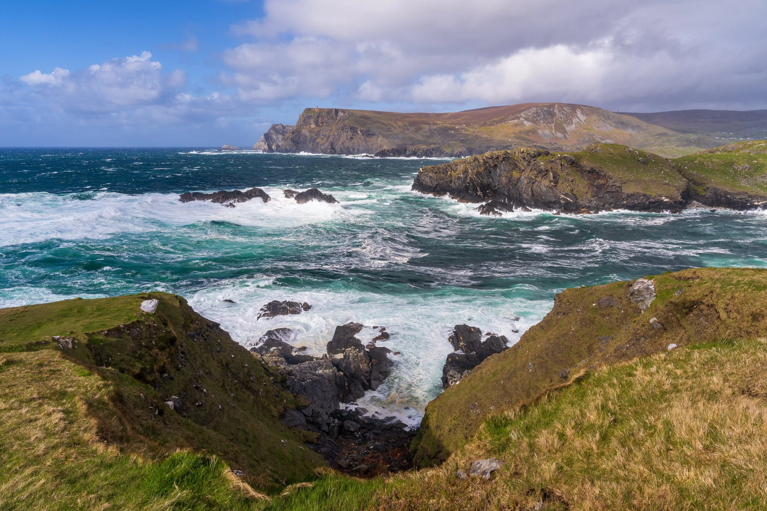 One of the finest views in Ireland, with the Glen Head Signal Tower on Beefan and Garveross Mountain, with the point of the Sturrall Ridge showing behind it. Donegal at its best.