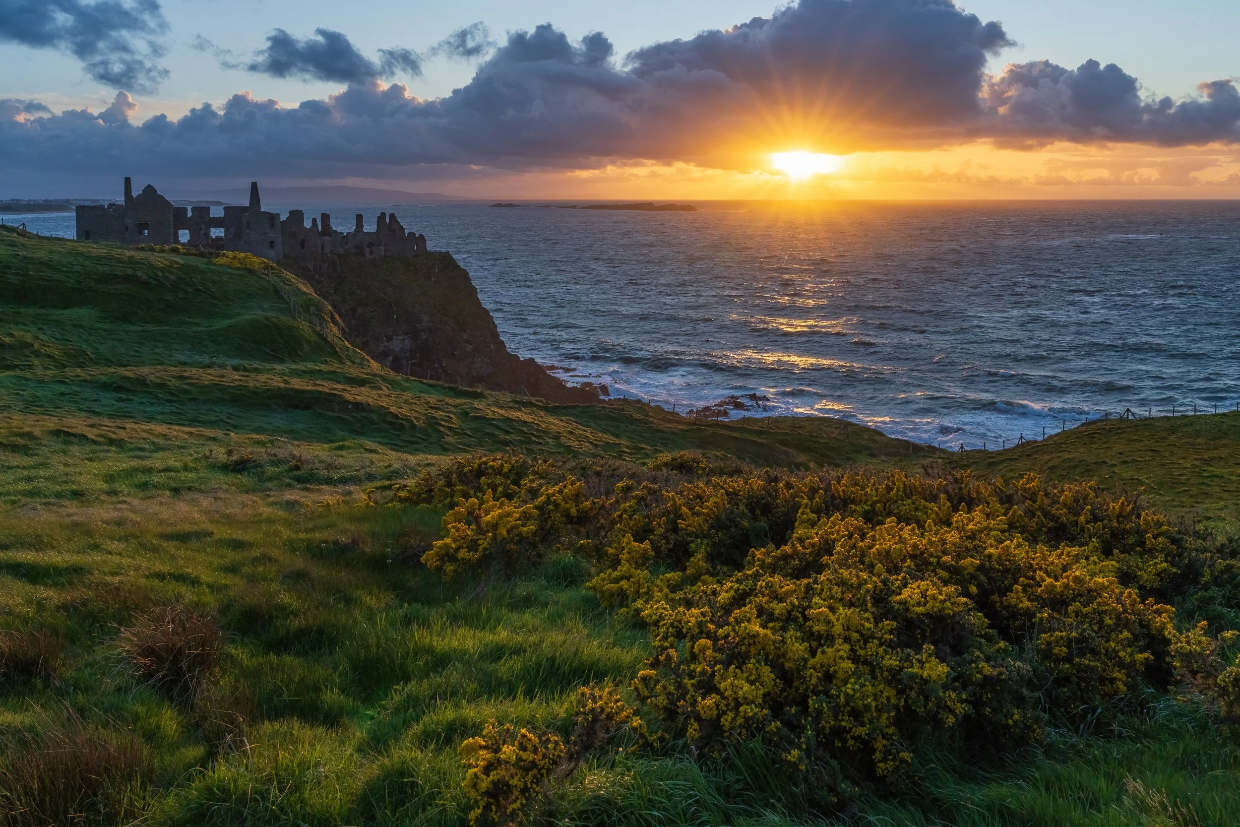 Golden sunset at Dunluce Castle