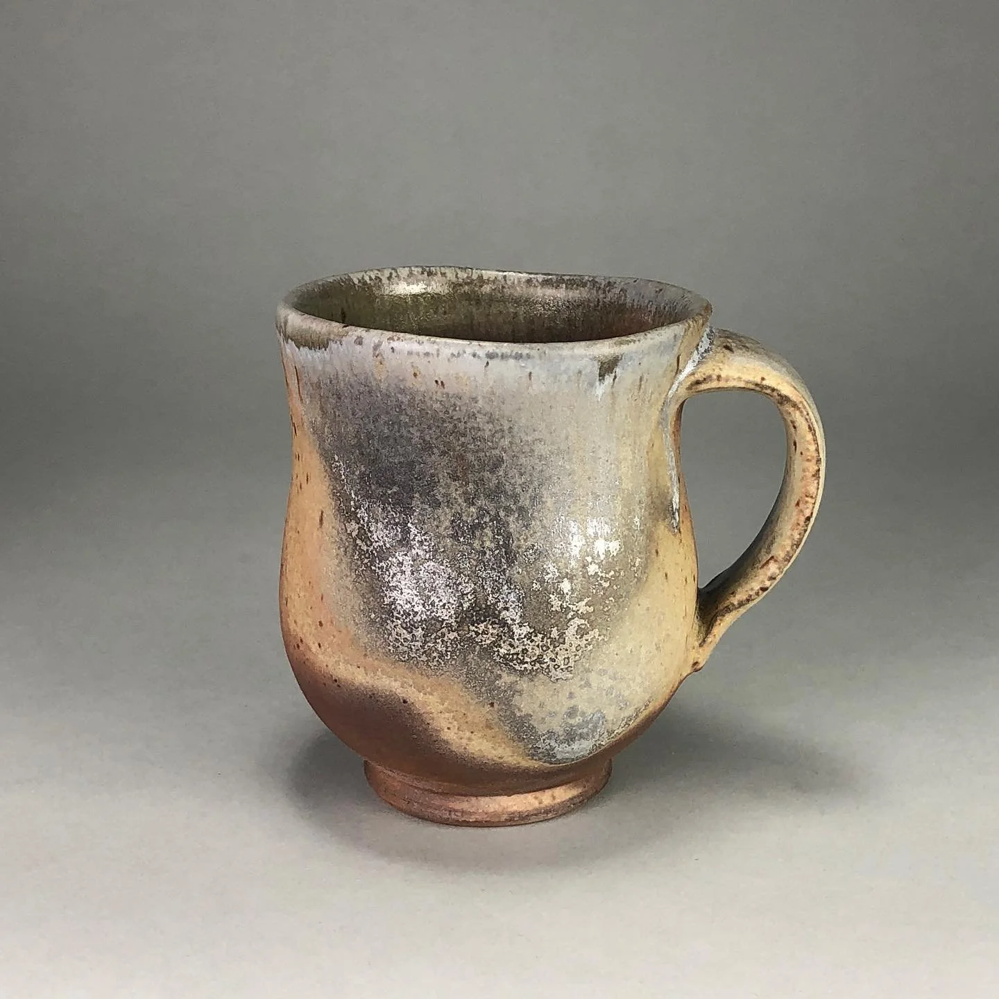 Another mug that will be available at this weekend&rsquo;s Art Trail Hub Crawl. I love the wave of color transition produced by flame flux! This little mug contains an apple wood ash glaze that came from two trees that stood on my parent&rsquo;s prop