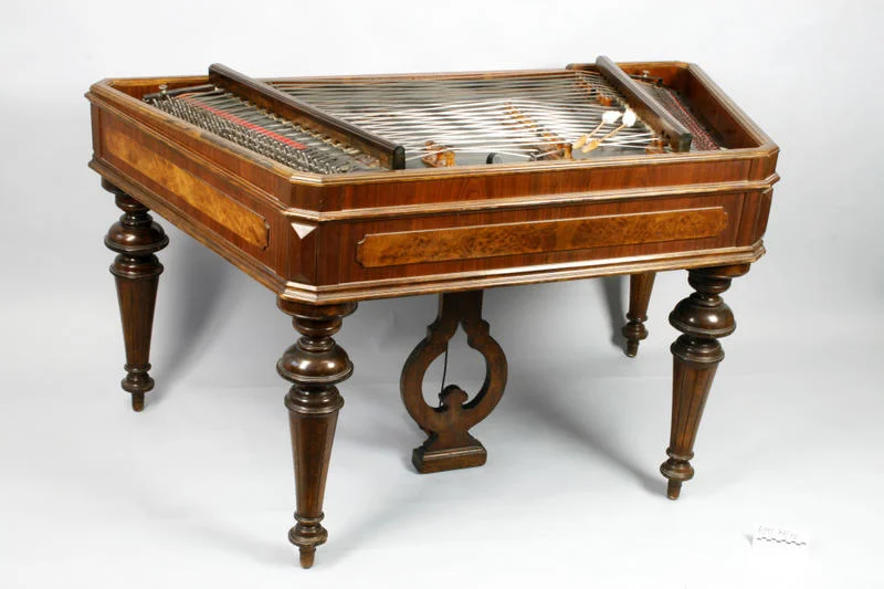 A cimbalom. Used to double the piano intro.