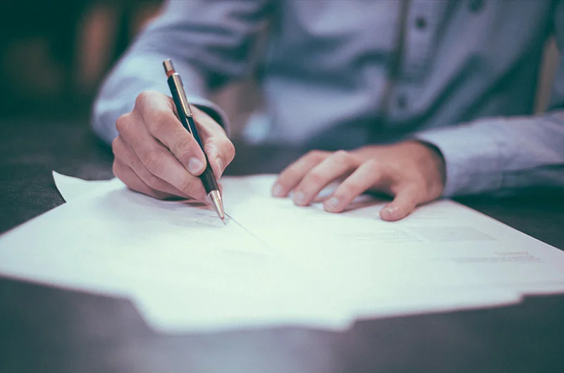 new-director-signing.jpg