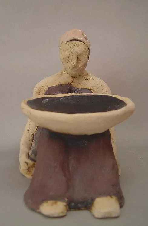 woman with bowl on knees.jpg