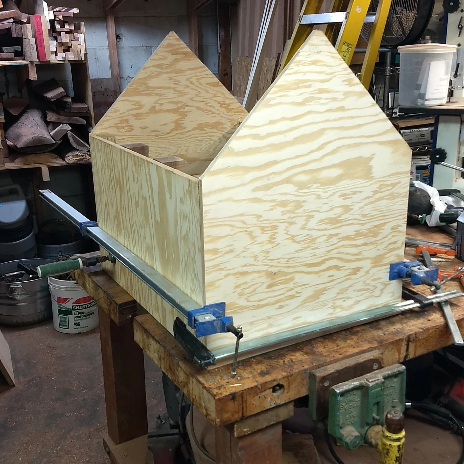 The outside of the library is a marine-grade plywood. After sanding and priming, the sides and ends become "canvasses" for the artist to work on.