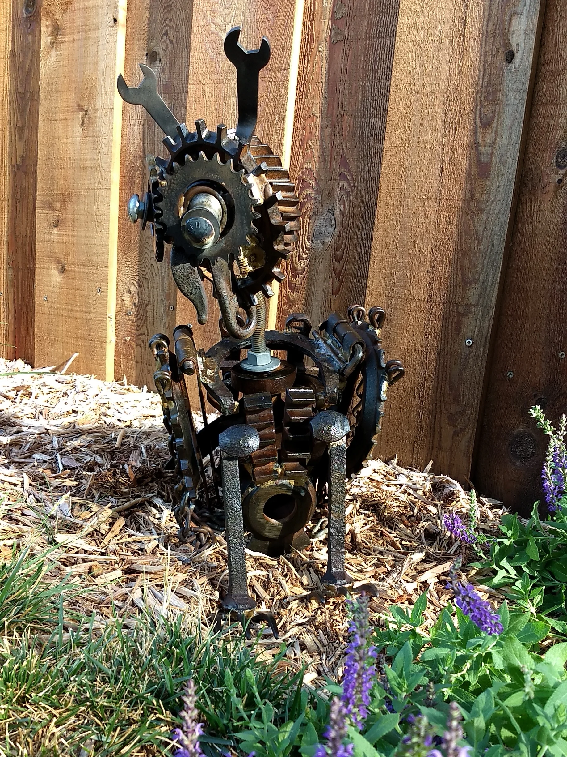"Owlice" sculpture with wings down