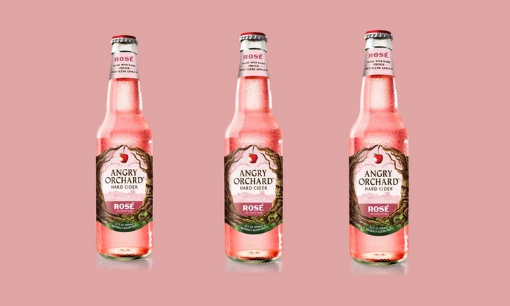 Angry Orchard Rosé Cider What it's made with: A blend of French-sourced Gala, Fuji, Red Delicious, Golden Delicious, Granny Smith, and red-fleshed apples. What it tastes like: Apple-y with a crisp and dry wine-like finish. What to sip it with: Charcuteries spreads, shellfish, and spicy dishes.