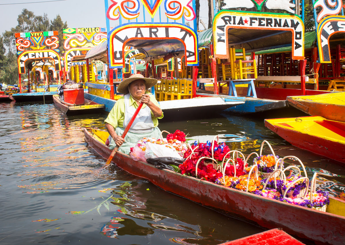 Small-boat-filled-with-flowers-in-Xochimilco-Mexico-City-1200x853.jpg