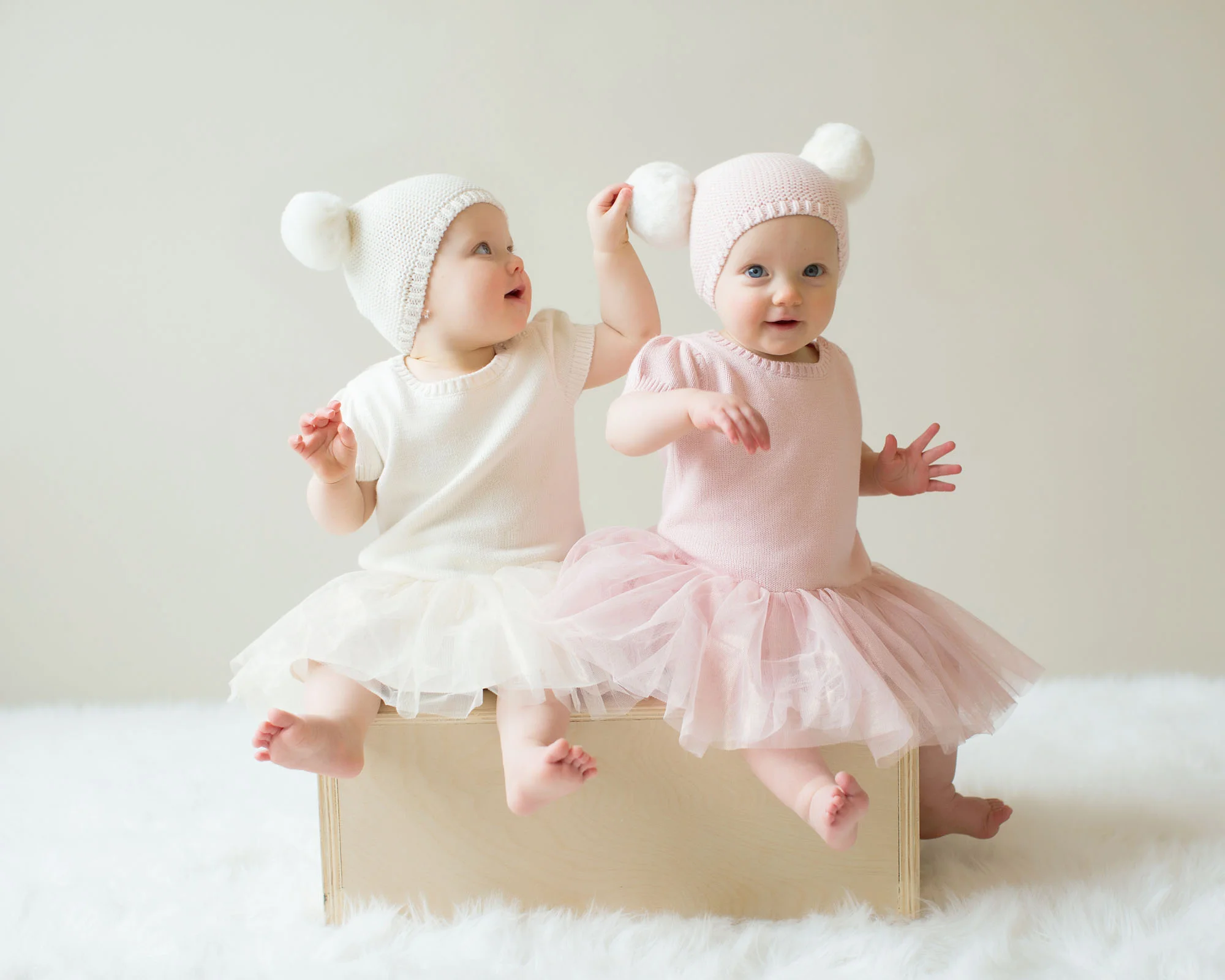 one_year_old_twins_with_winter_hats.jpg