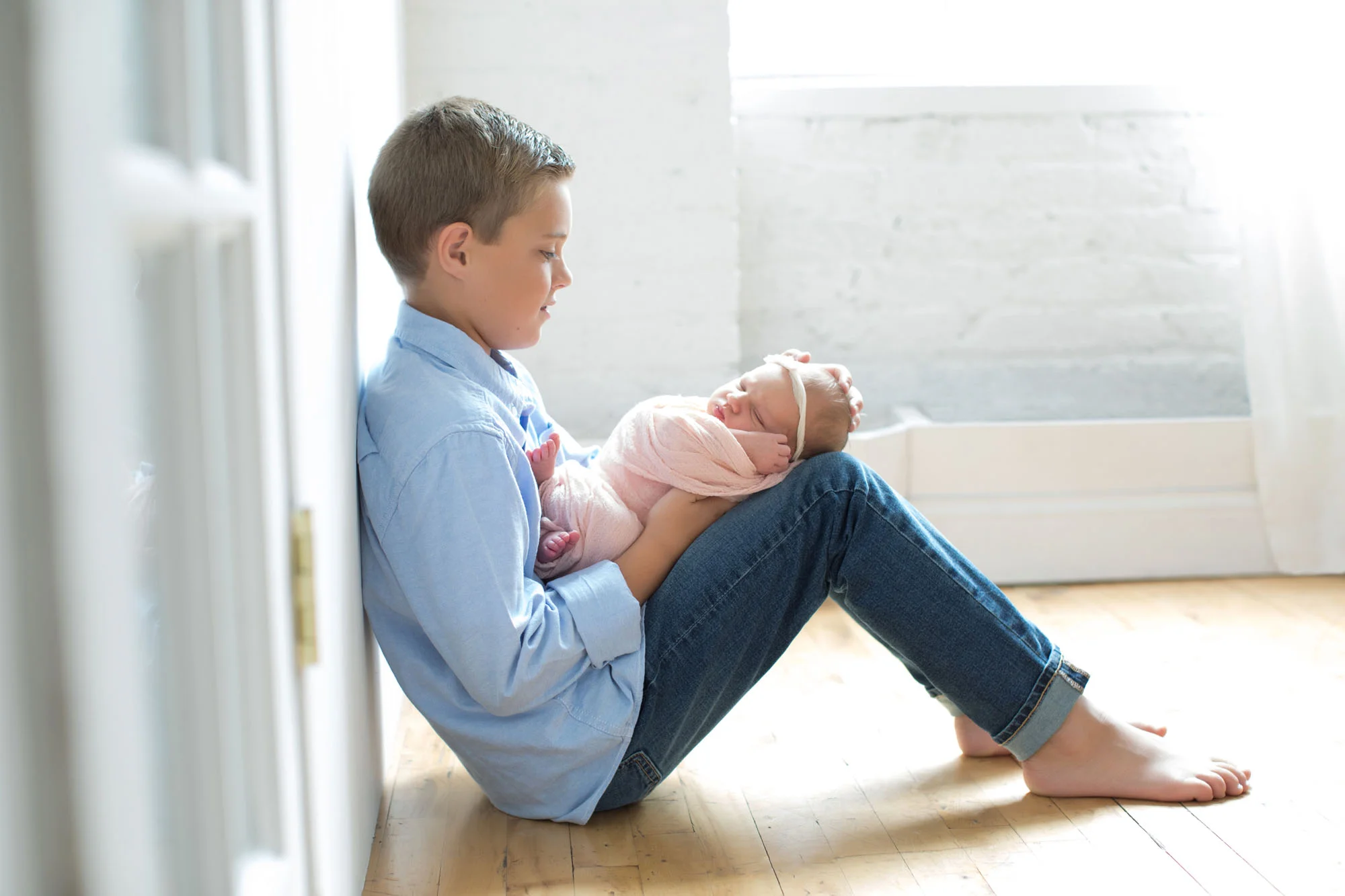 big_brother_holding_baby_sister.jpg