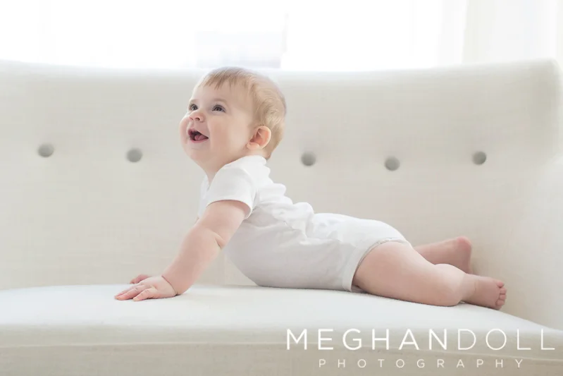 six-month-old-boy-on-belly-on-couch