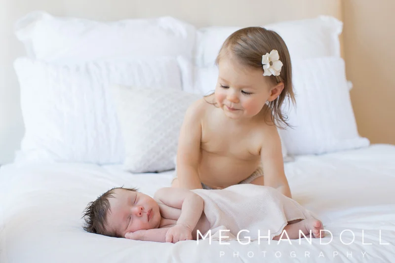 big-sister-admires-new-little-sister