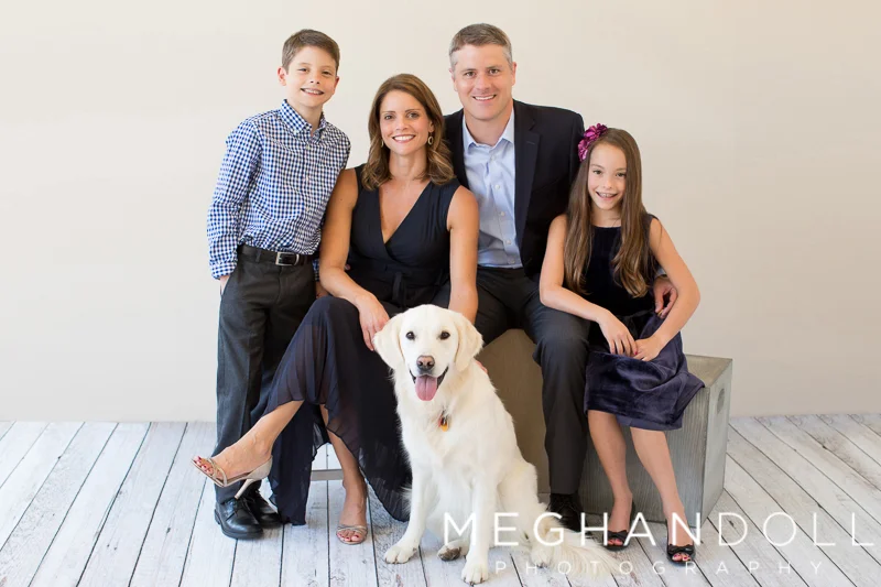 nice-family-of-four-poses-with-their-dog