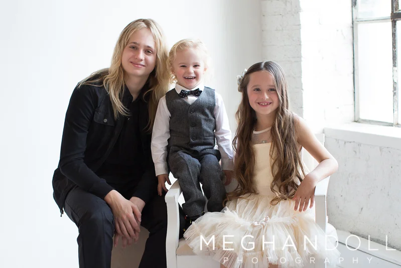 three-siblings-dressed-in-black-and-white