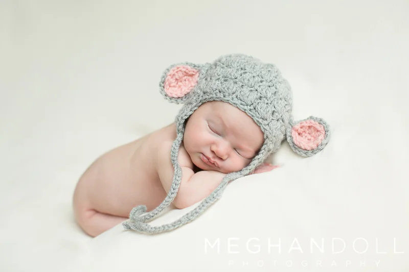 newborn-boy-sleeps-in-mouse-hat