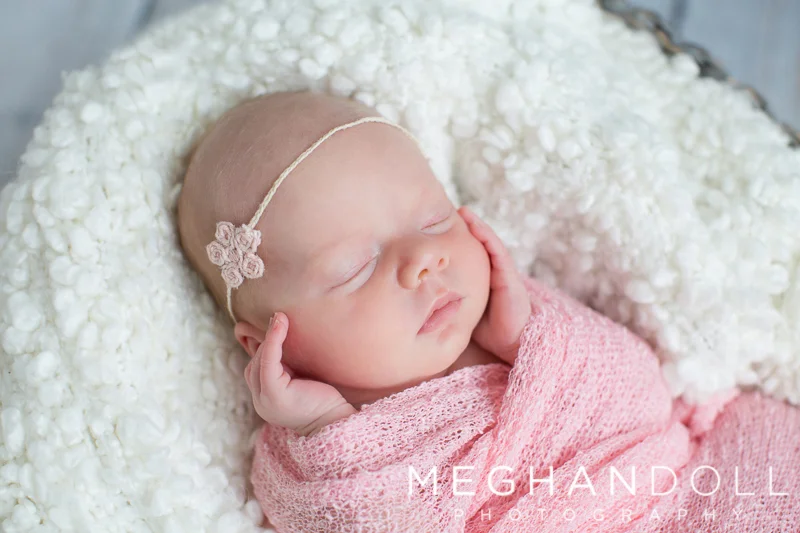 twin-newborn-girl-in-light-pink