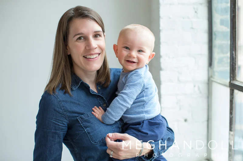 mom-and-baby-boy-smile-by-window