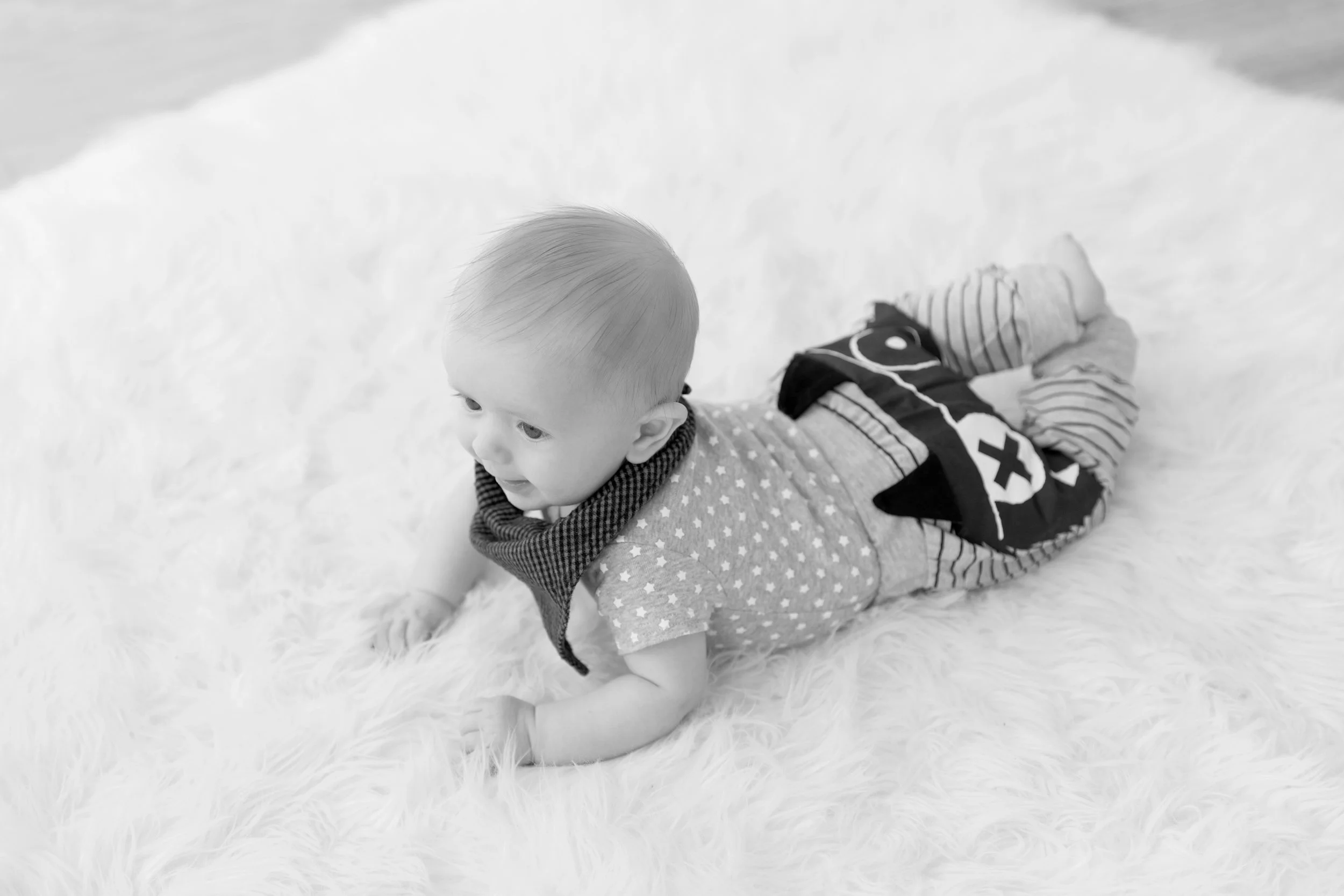baby-on-belly-smiling.jpg