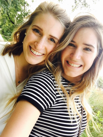 Emma, left, with her sister.
