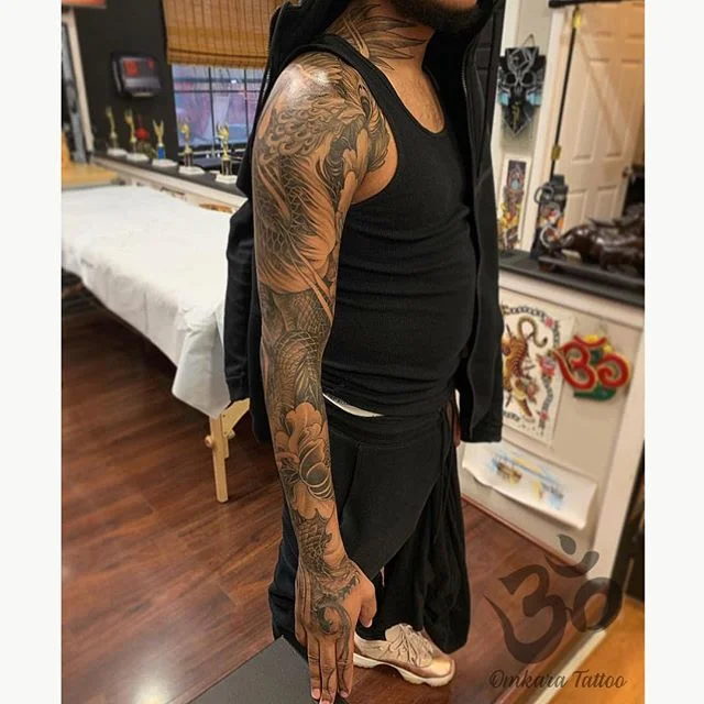 Phoenix, snake, and peonies full sleeve by @nhaomkaratattoo | Nha&rsquo;s books are closed