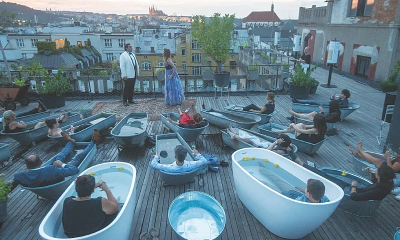 Listening to opera from a rooftop bathtub: Czech!