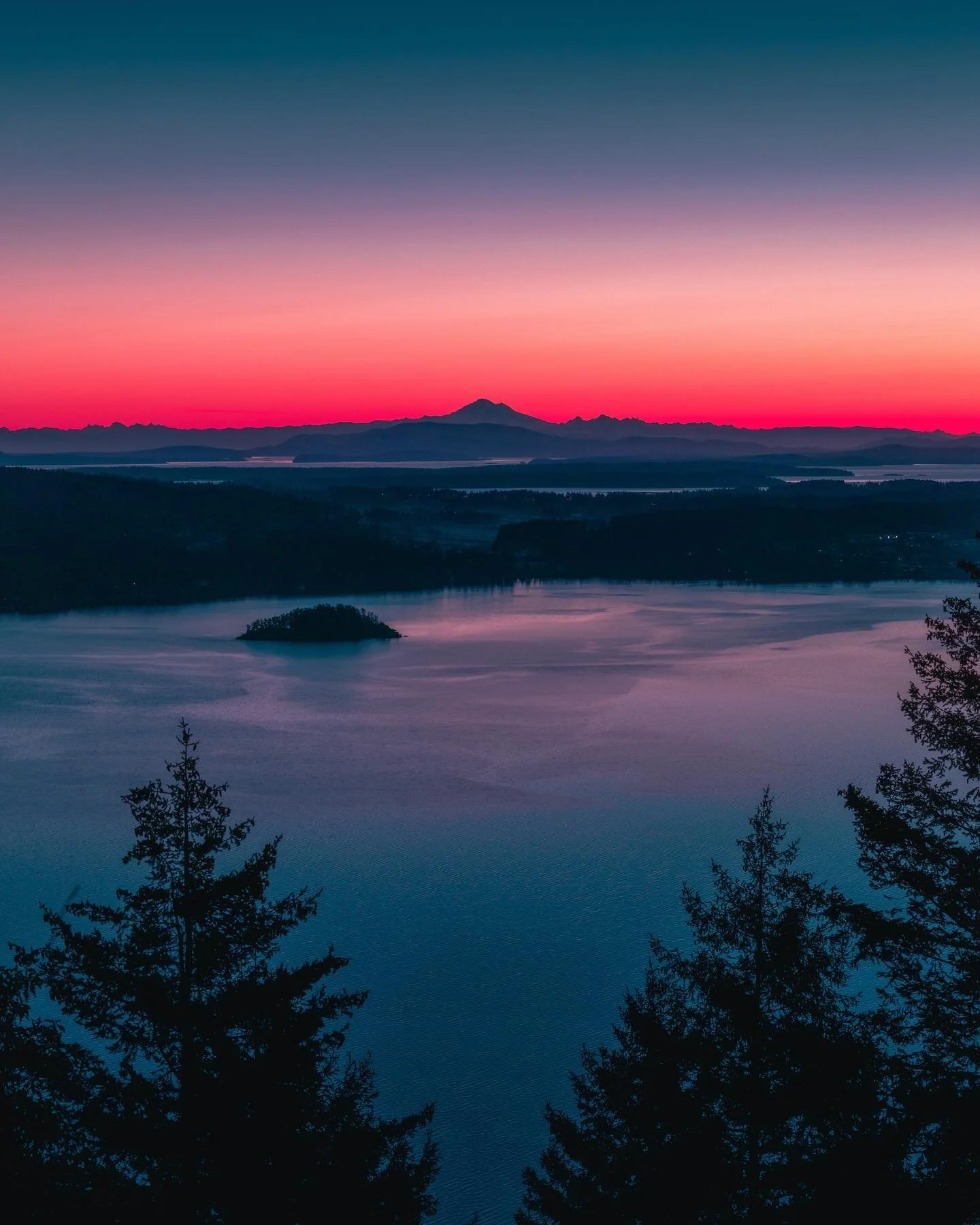 Crimson Horizon.

Here&rsquo;s the second of the three shots I took this morning. It&rsquo;s actually a vertical panorama of about 7 or 8 photos as I was using my 70-200mm f/2.8 yet wanted to get a wider shot without changing lenses. It worked out we
