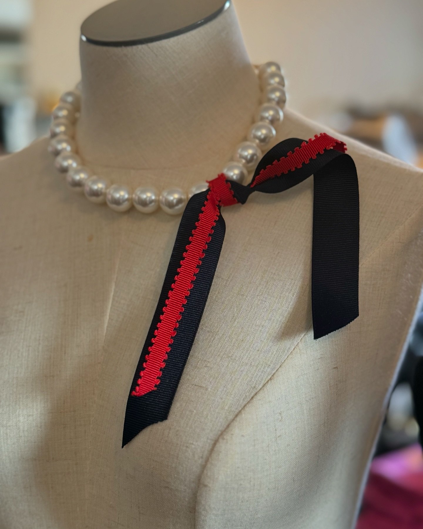 Adding ribbon to a pearl necklace is always the right move!