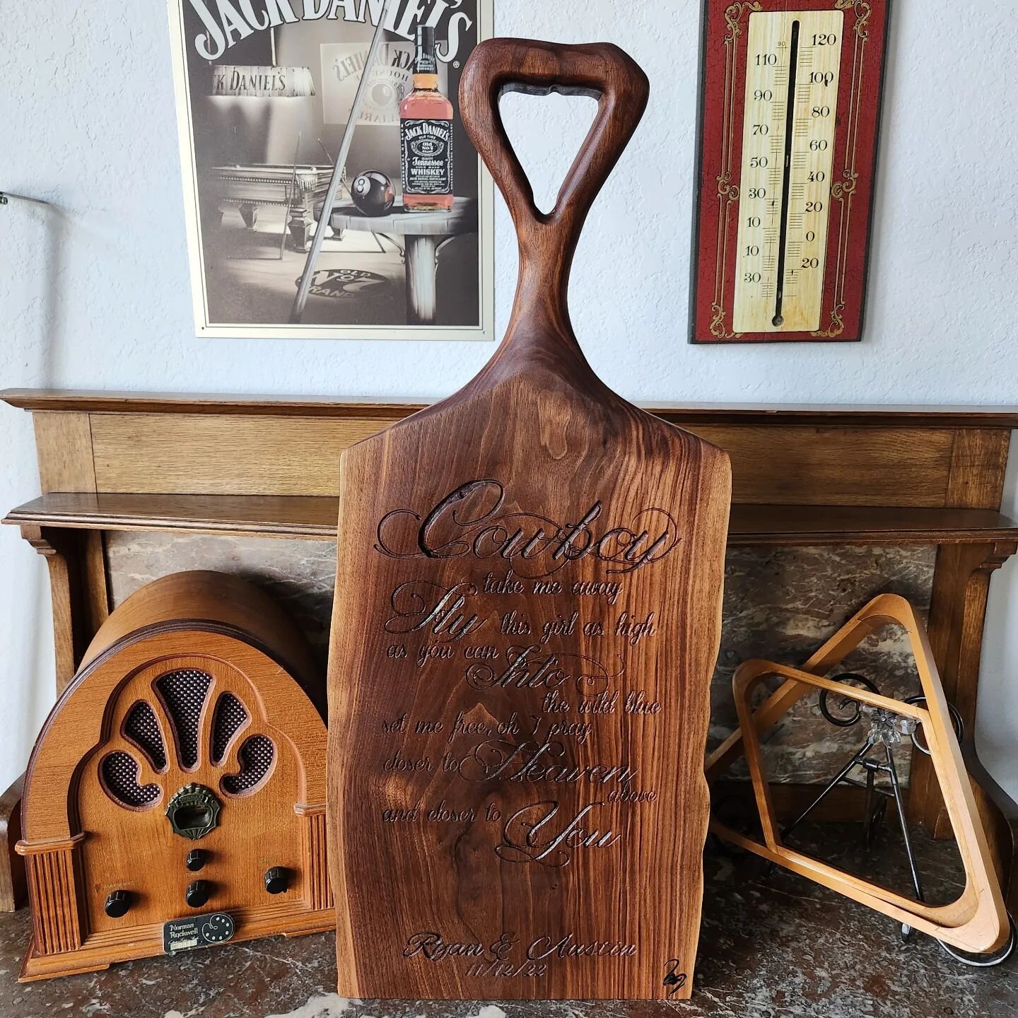 Giant 2&quot; thick live edge, hand carved, black walnut charcuterie board with song engraving and the happy couples' name and wedding date.

The specific song chosen is her favorite song and apparently quite fitting for their relationship. 

#newlyw