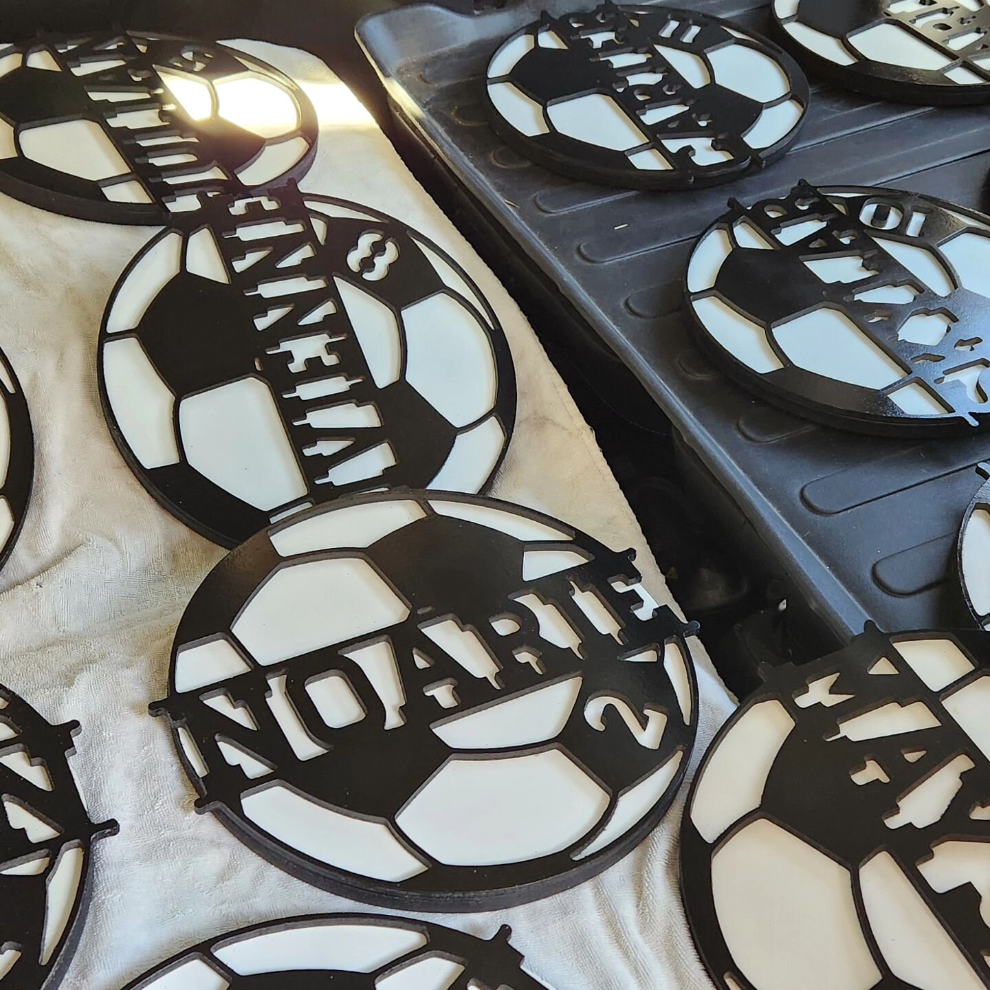 I made some neat soccer trophies for 2 soccer teams, a u10 and a u8. They're simple but fun. 12&quot; diameter with each player's first name and number. Unfortunately, I only took this picture, but there's a total of 19 trophies.

#hdysl #soccer #you