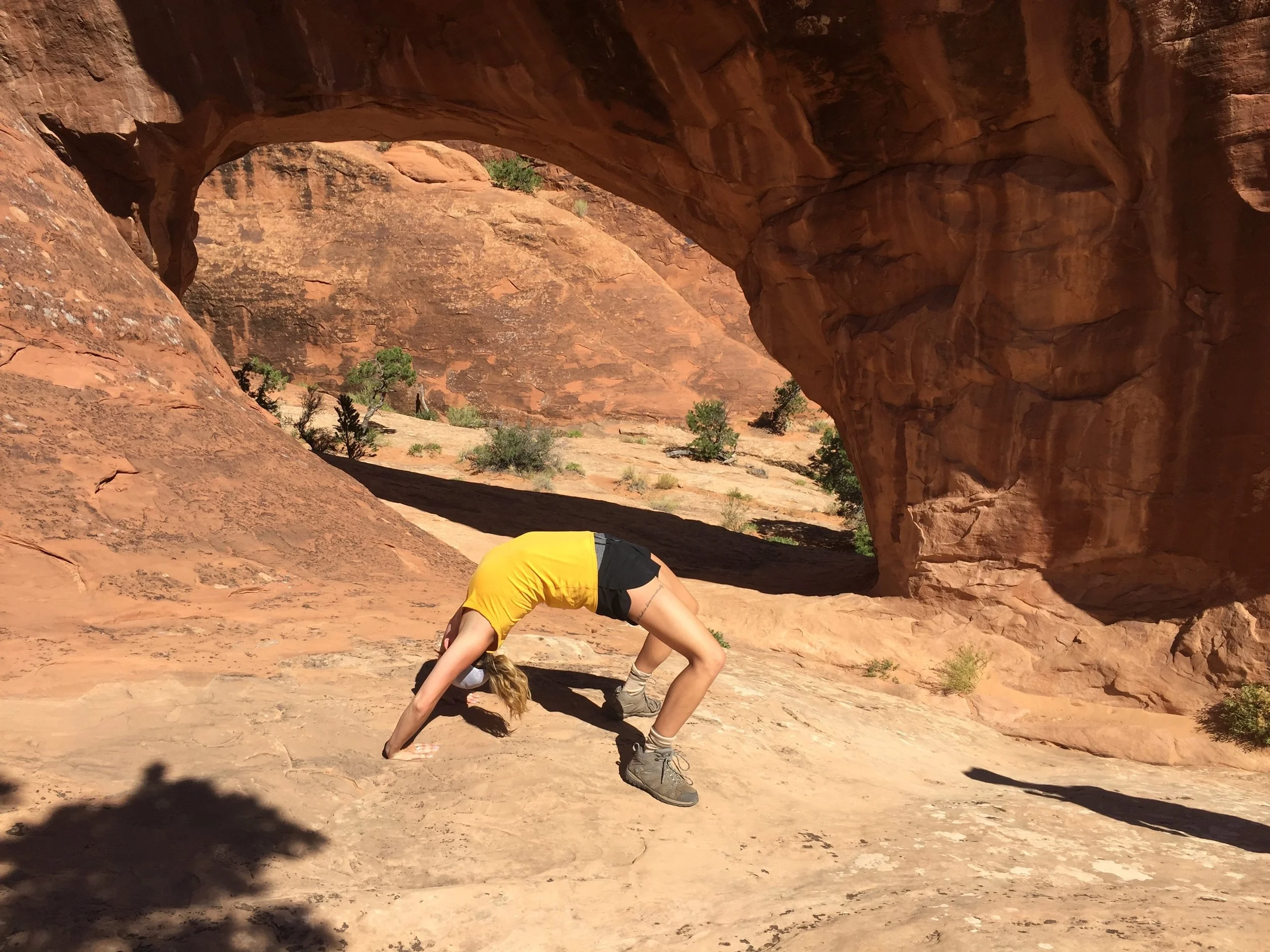 PRIVATE ARCH. Tucked below the trail and easily passed through is Private Arch. This was the last Arch we saw on the trail and was the only arch on the Primitive trail on the 12-6 side of the hike. Please ignore the weirdo in front. 
