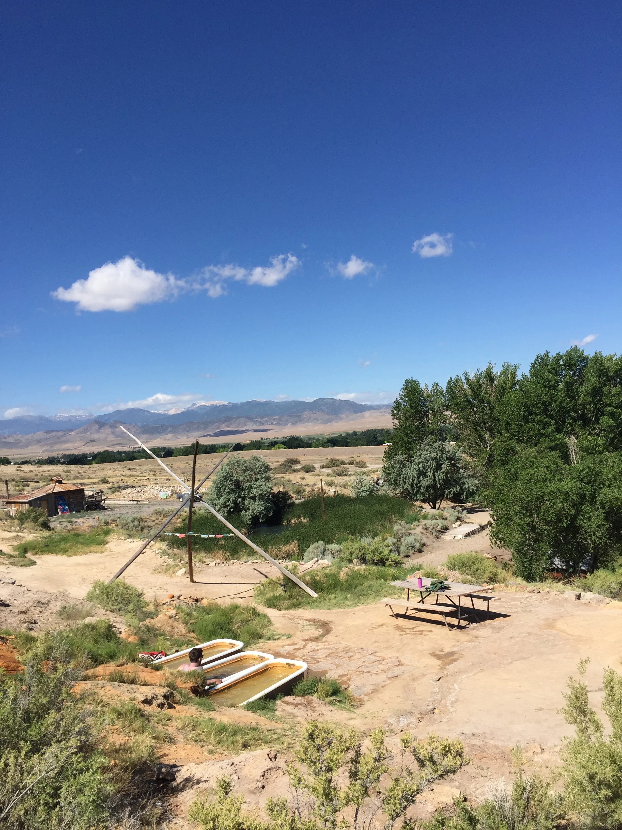 Three of the eight tubs with stunning views of the valley and mountains beyond.