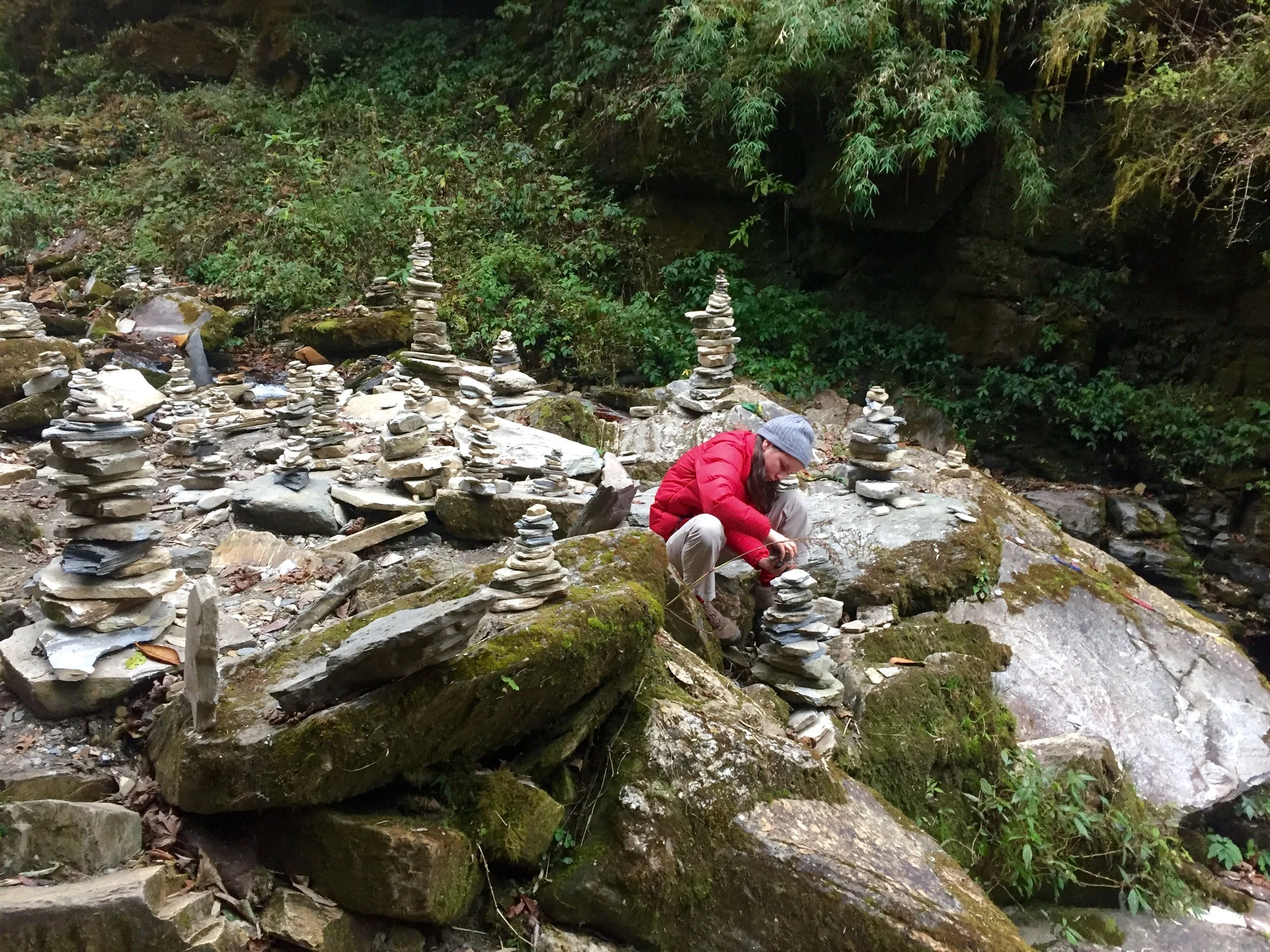 A groovy lil' photo of my groovy lil' daughter Bella returning to her practice of building rock castles during an interlude whilst trekking the Annapurna circuit in Nepal a few years back.