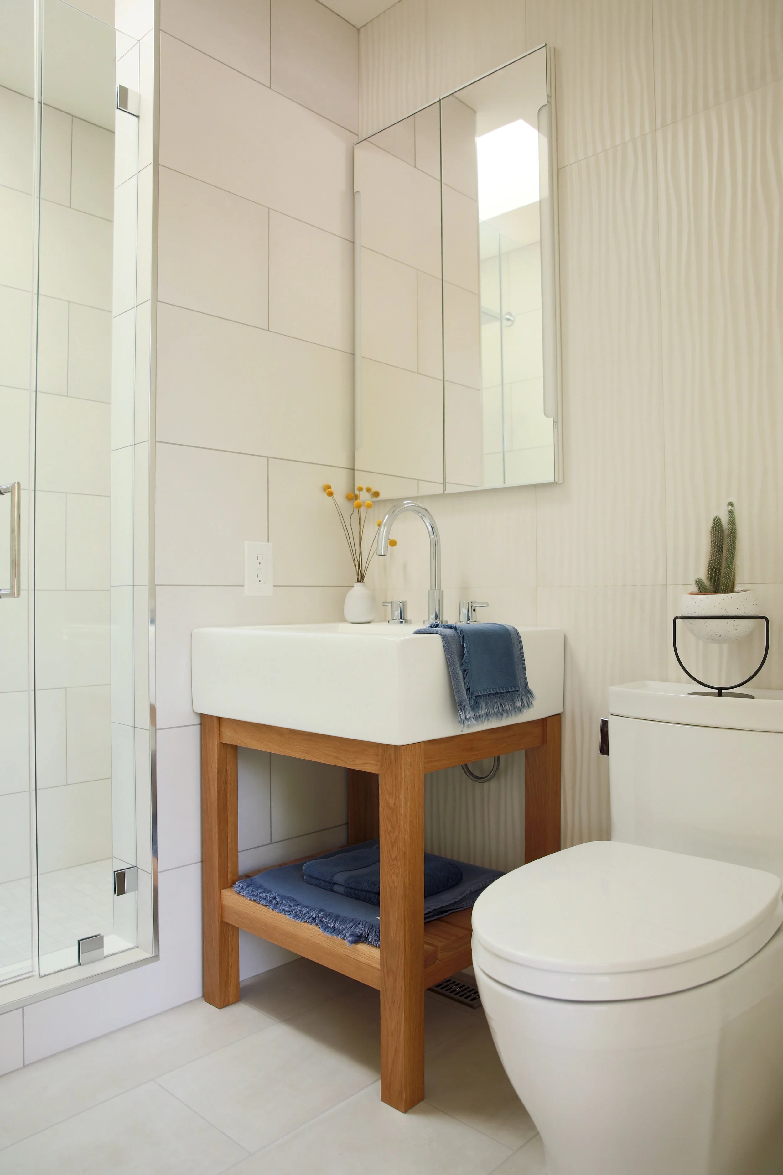 Pictured here, Stonewash Bath Sheet, Bath Mat, Hand Towel and Wash Cloth in Indigo. Shop here .
