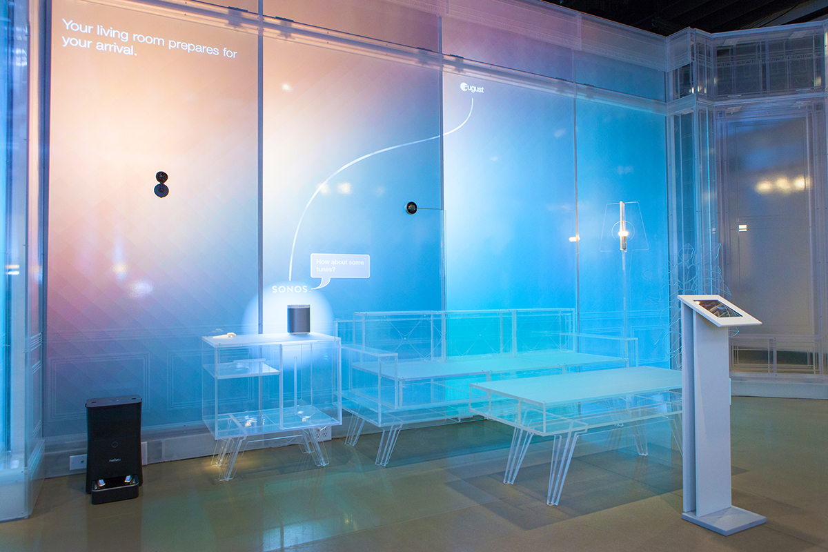 The living room tells interactive stories such as, "how can my smart home protect me from a burglary?" Or, "how can my smart home make sure I leave the house safe and efficiently in the morning?"