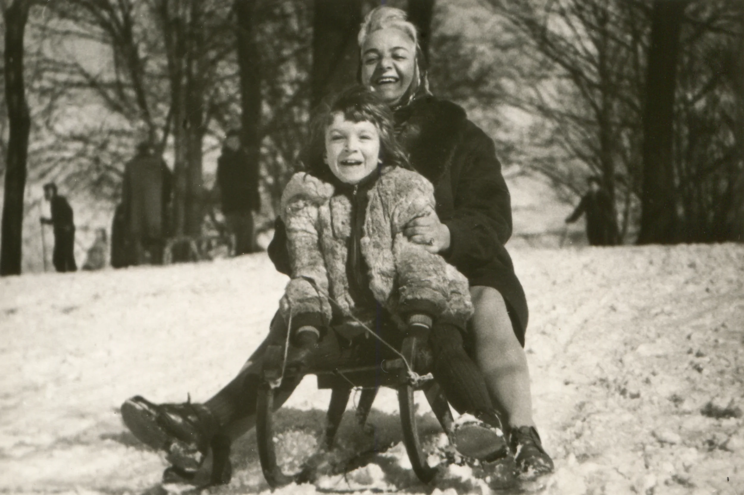 Vintage-photo-of-mother-and-daughter-sledding-142523782_2500x1662.jpeg