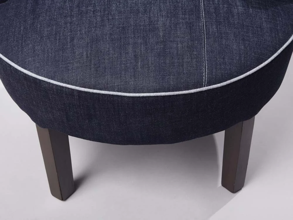traditionally upholstered denim armchair denim city amsterdam piping.jpg