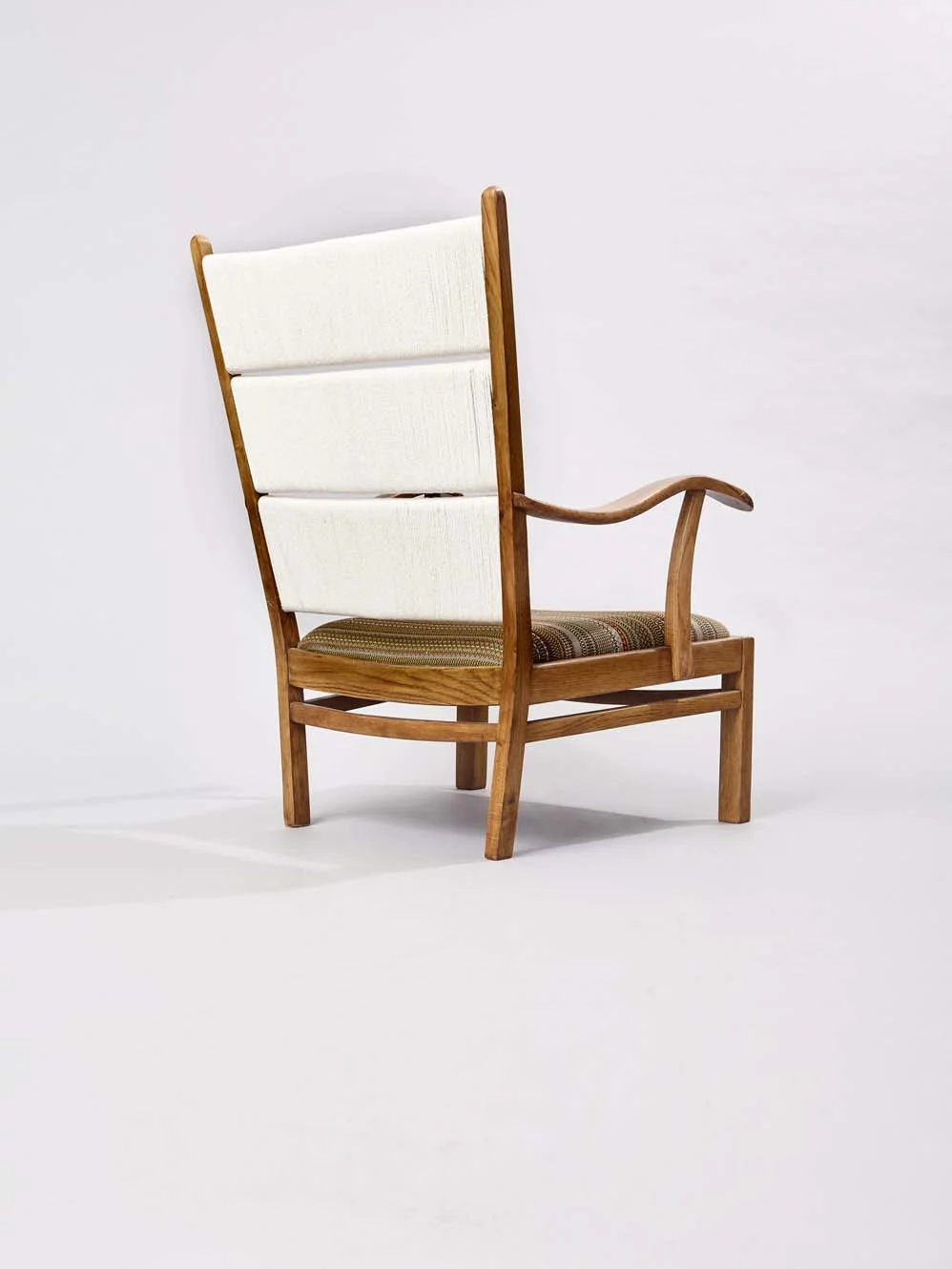 Oak chair covered in Paul Smith stripes back.jpg