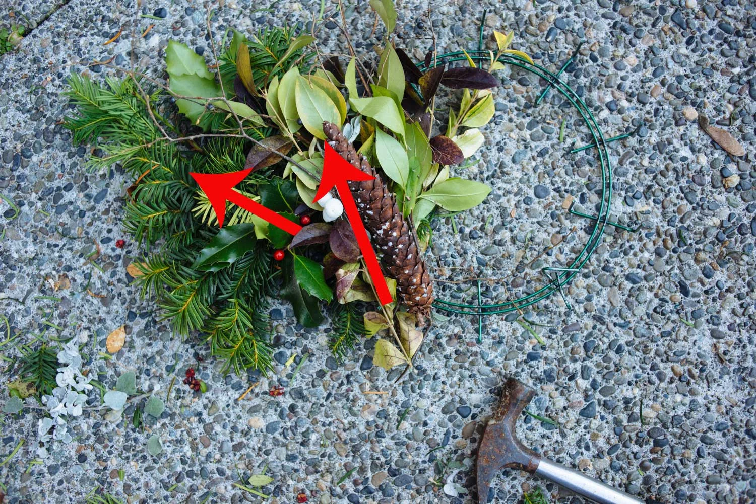 Lay bouquet 2 diagonally facing inward. Hammer down spikes. Repeat all the way around.
