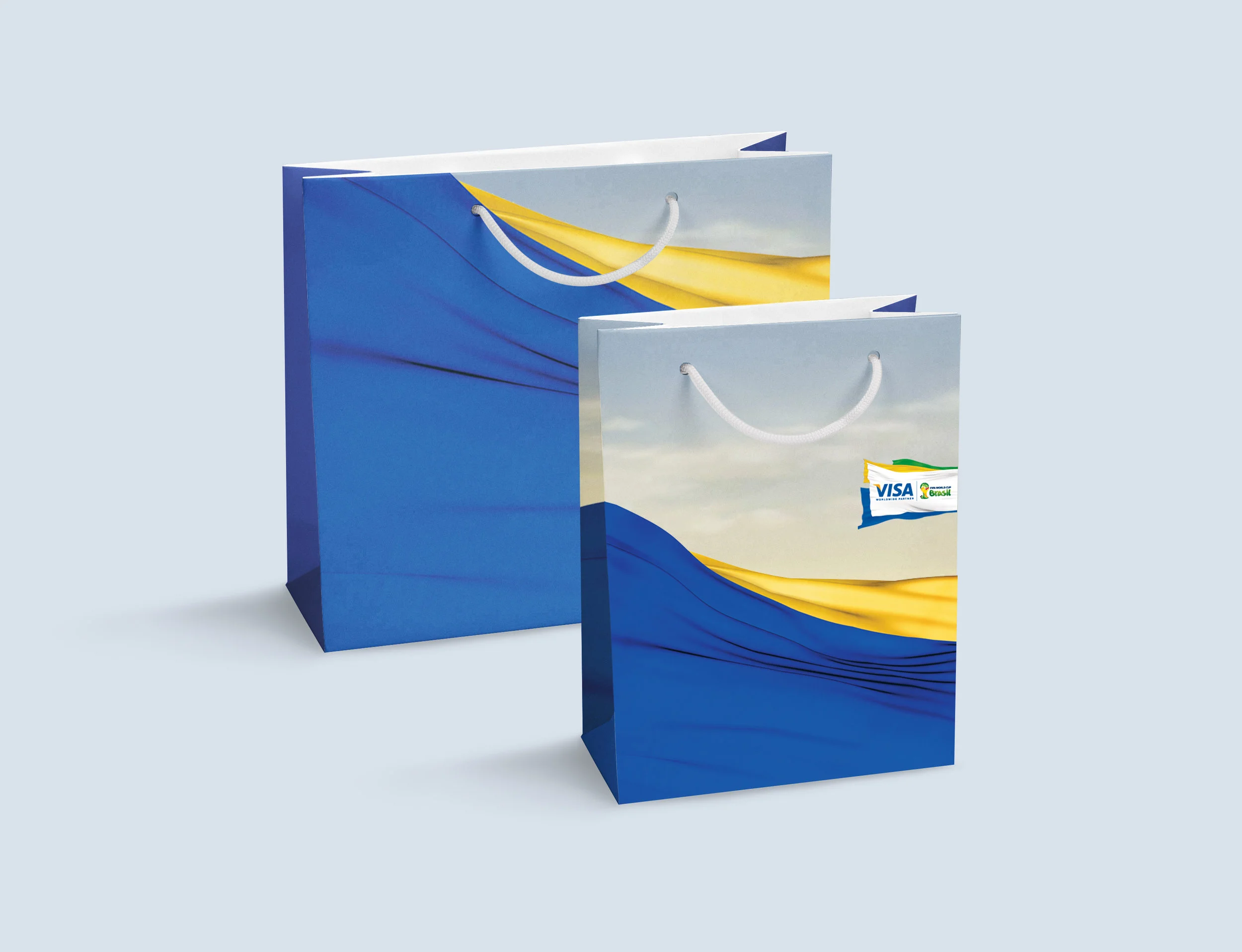 3D renders of fabric were used to create the unique flag elements in the system. The sky background was created using vector mesh artwork, to scale easily for large application.