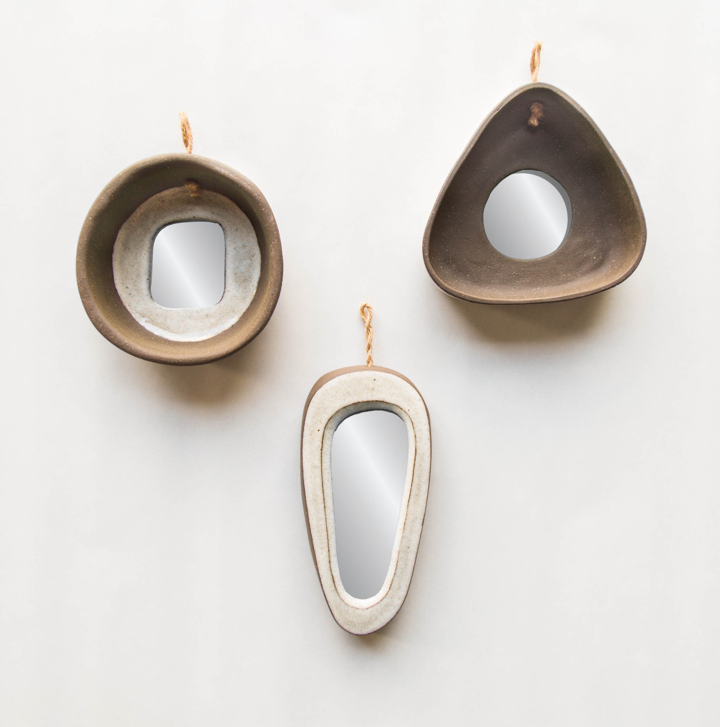  brown stoneware  white glaze/unglazed hangs with jute rope  