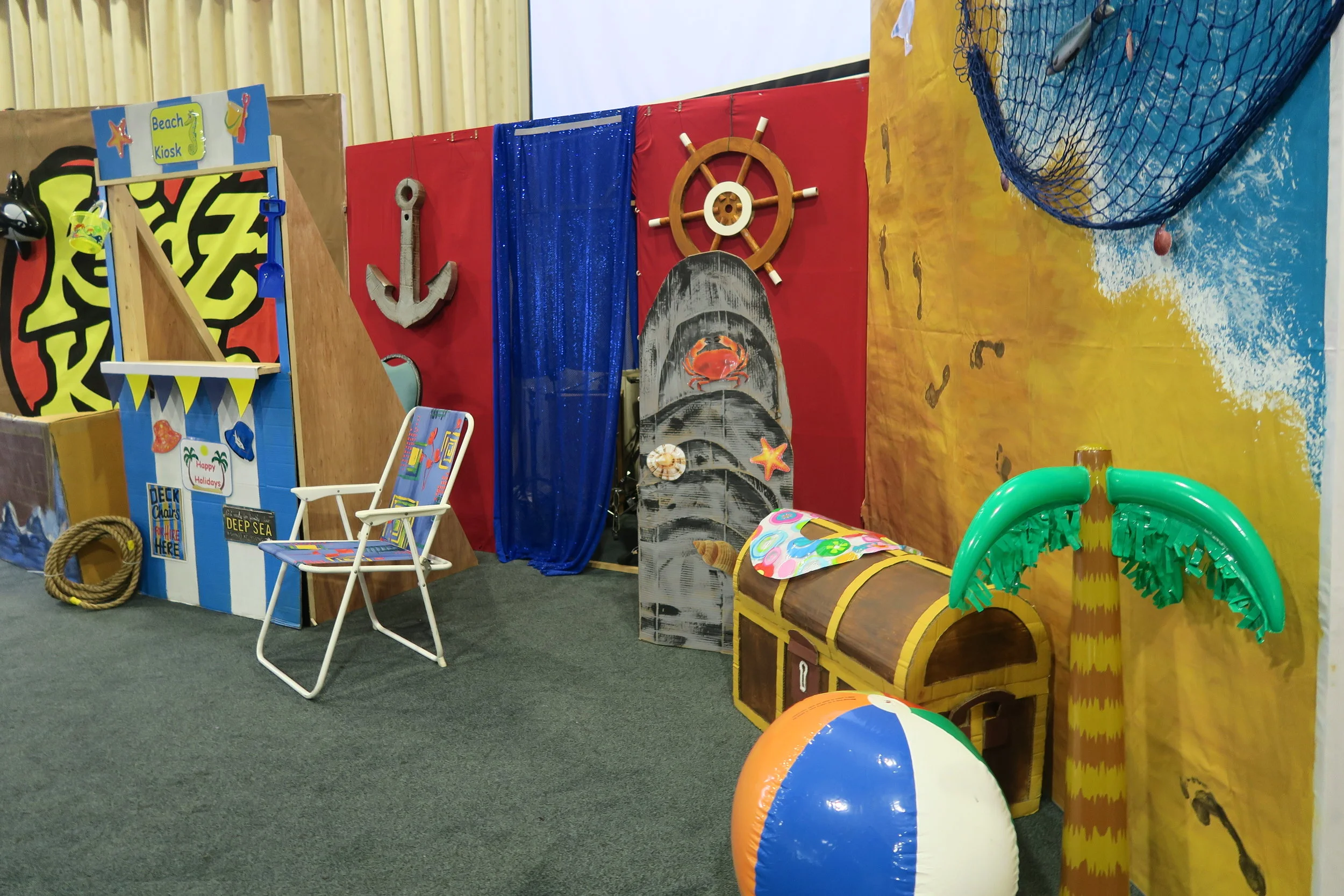  Various props featured elsewhere on this site were pulled in to create a lively seaside theme for holiday club.     