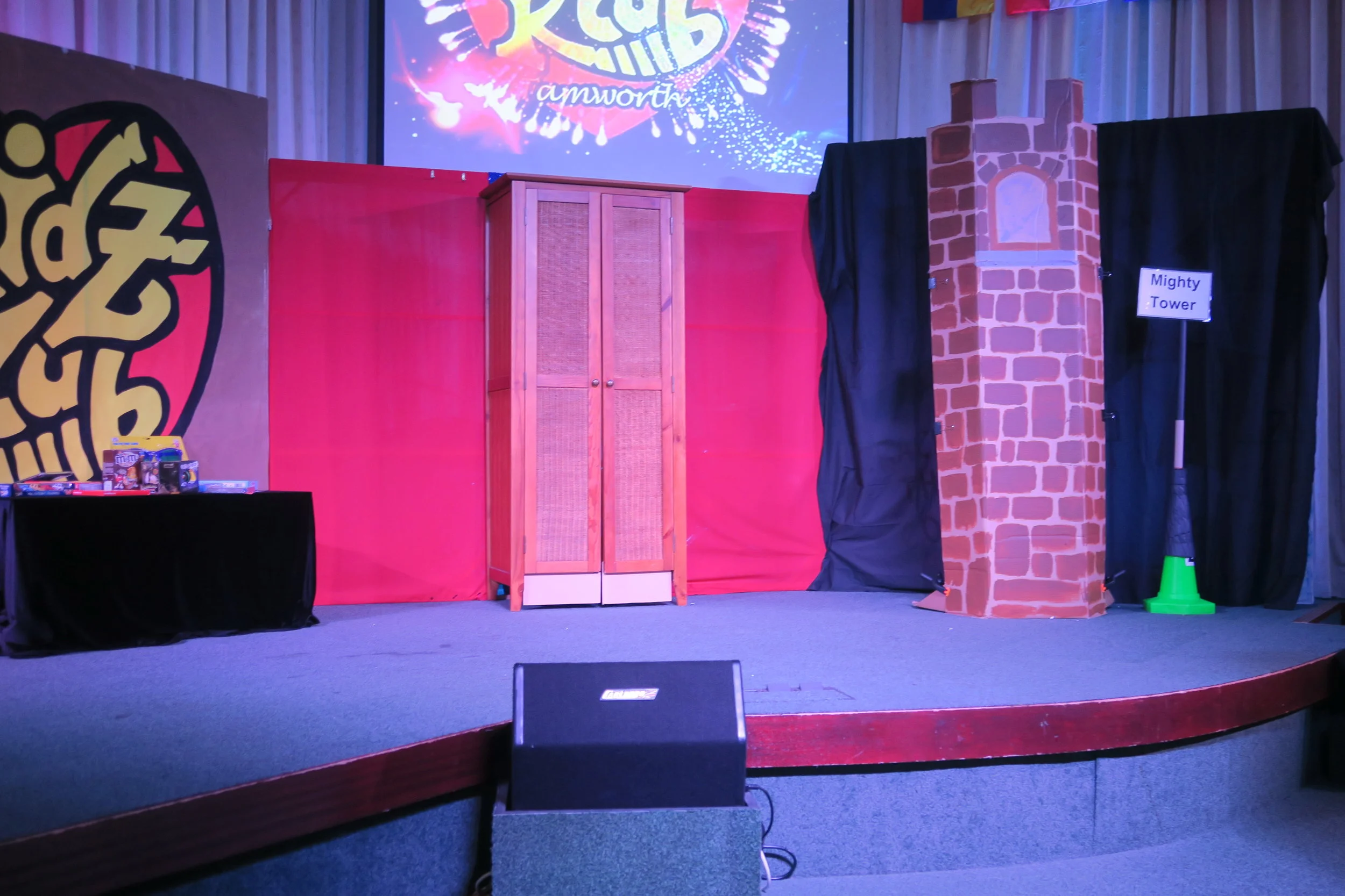  Backdrop from  ‘It’s Cool to be Wise’  series. Travelling machine (wardrobe) and cardboard strong tower.  