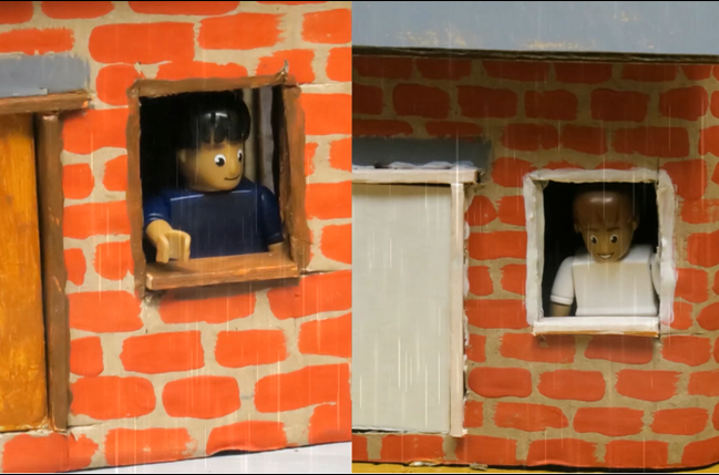   SLIDE 11  But both builders watched from their windows as the storm raged. 