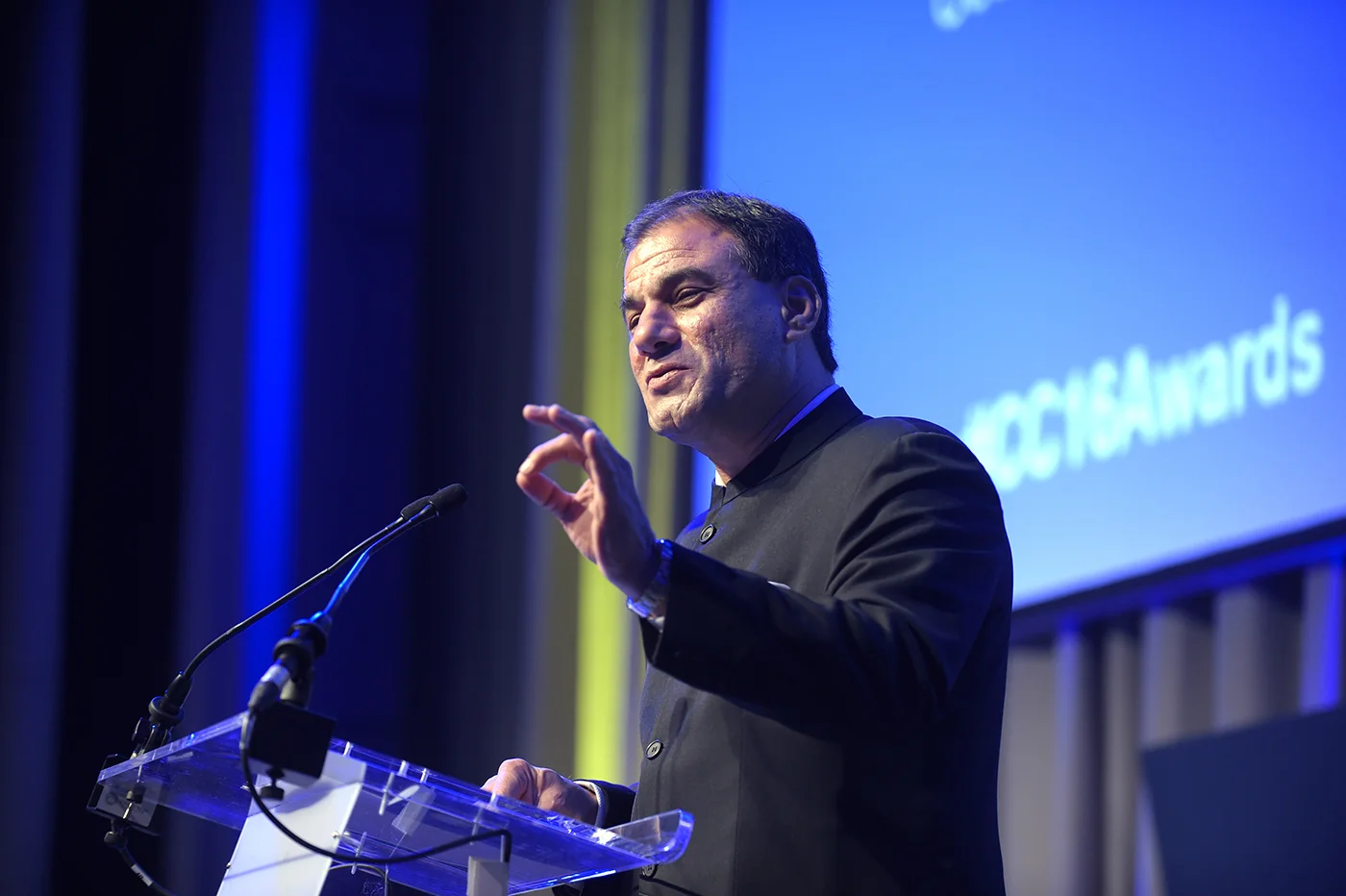 Lord Bilimoria speaking at an awards ceremony.