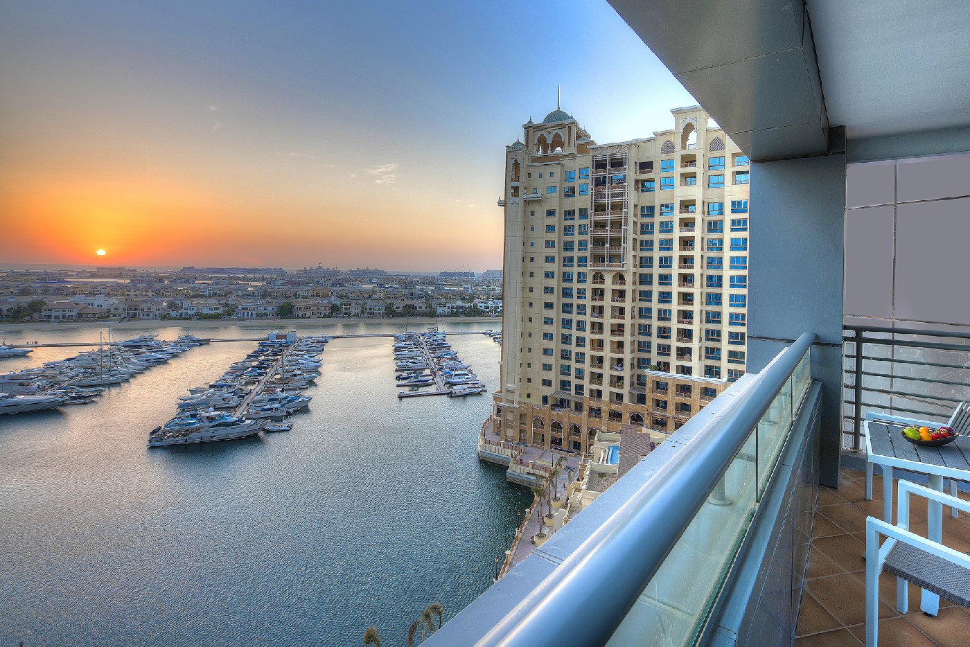 Dukes Dubai balcony view of the sea and boats