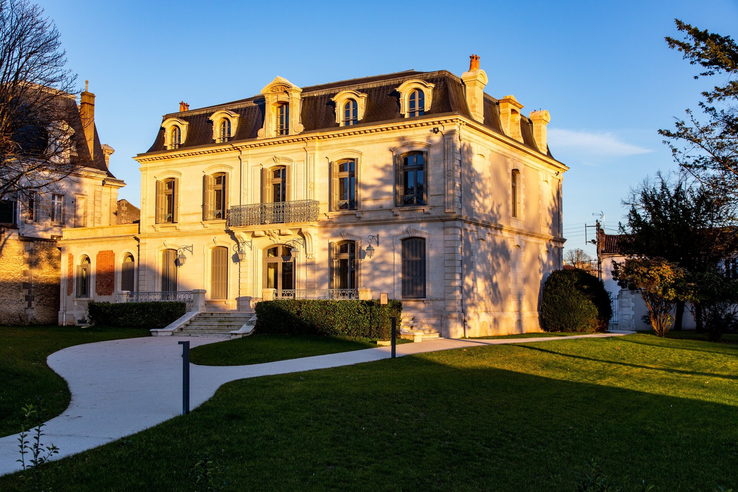 A French style country home at sunset