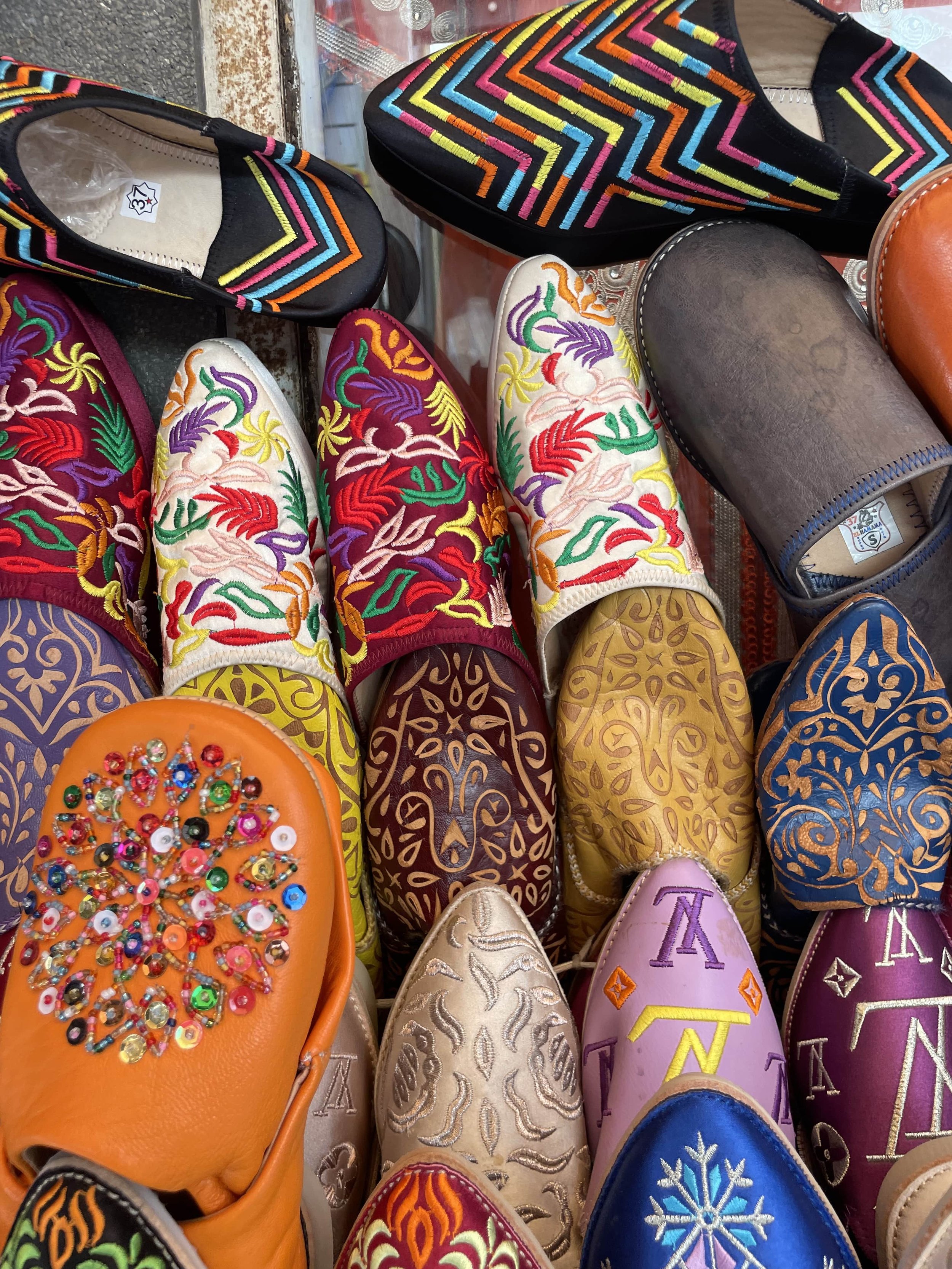 Colourful slippers with embroidery on them